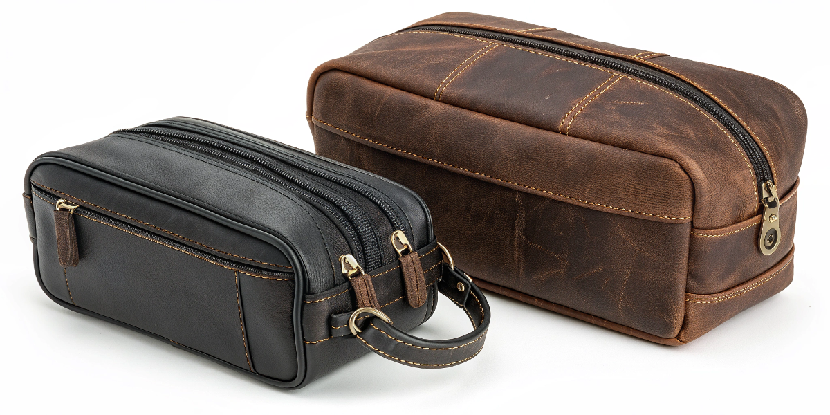 a classic leather dopp kit next to a modern multi-pocket toiletry bag