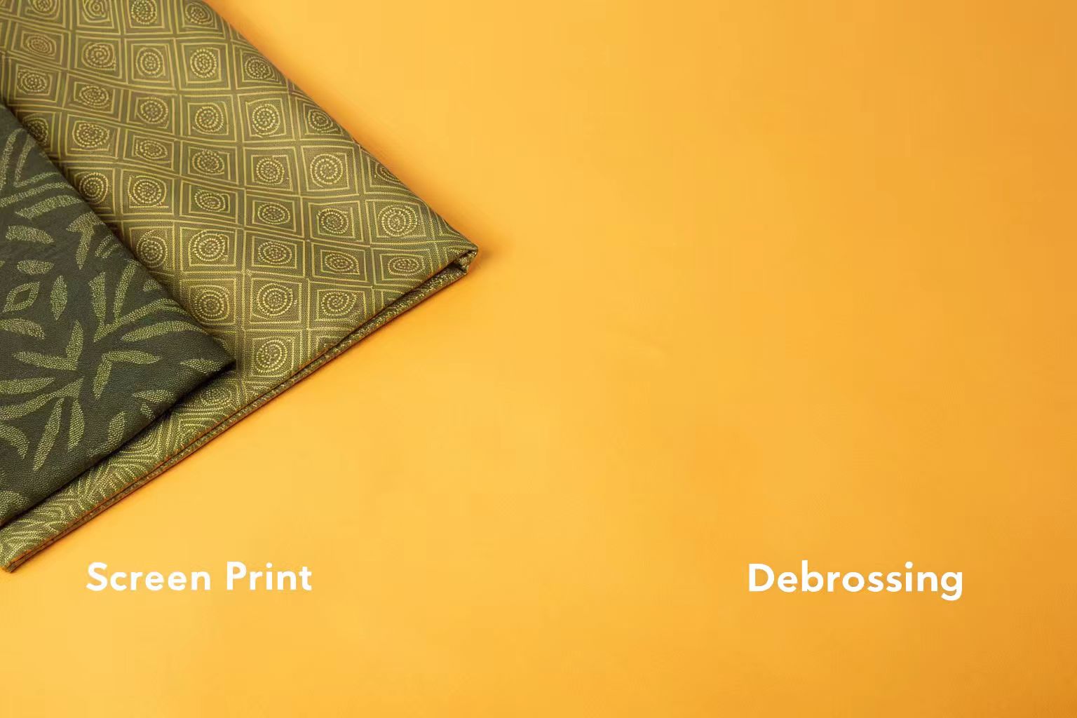 A close-up shot comparing different printing techniques on fabric: screen print, embroidery, and debossing
